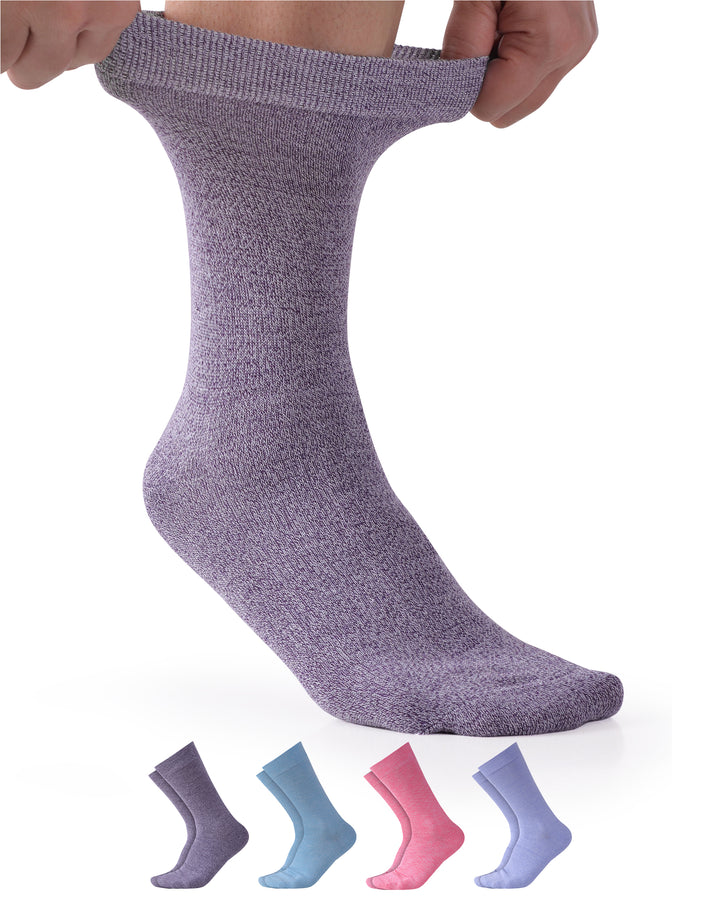 Purple sock held up with other colored socks in the background on a white background