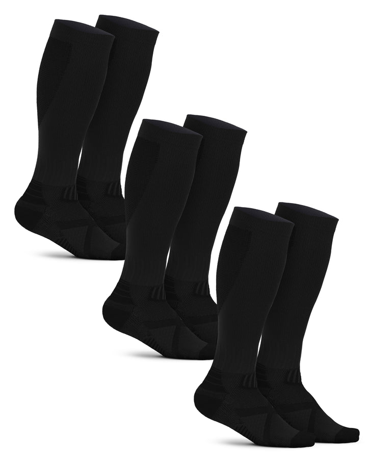 Set of six black knee-high socks on a white background