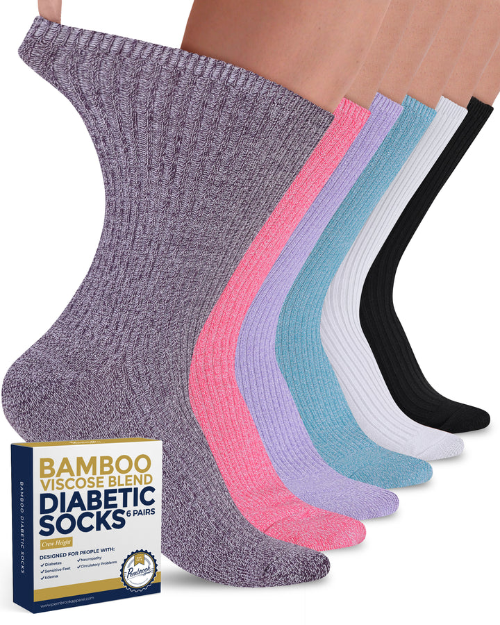 Set of diabetic socks in various colors with a box labeled &