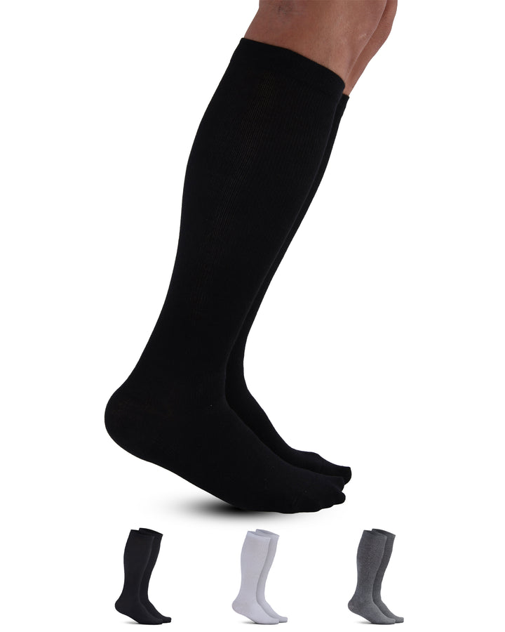 Black knee-high socks being worn on a white background with additional pairs of socks displayed below.