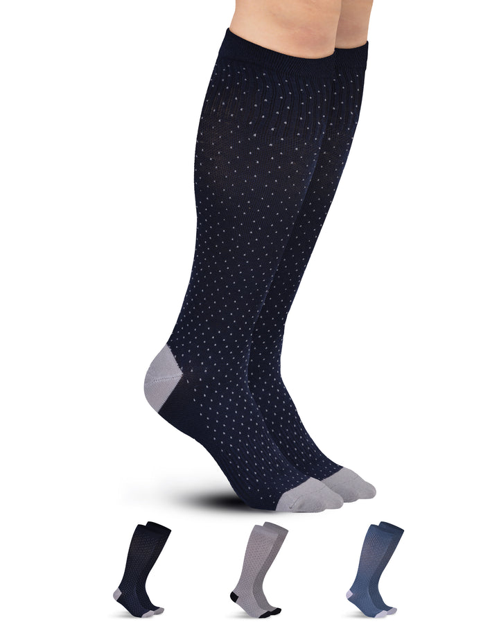 Navy knee-high socks with gray toes and cuffs on a white background