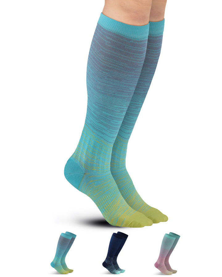 Colorful knee-high socks with a gradient design on a white background