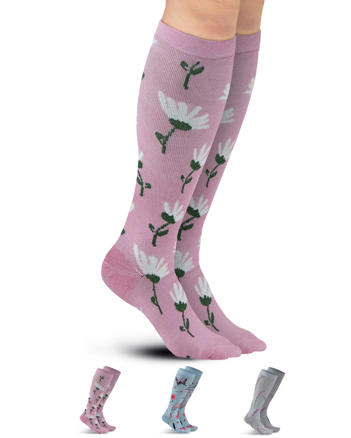 Knee-high socks with floral design on a white background
