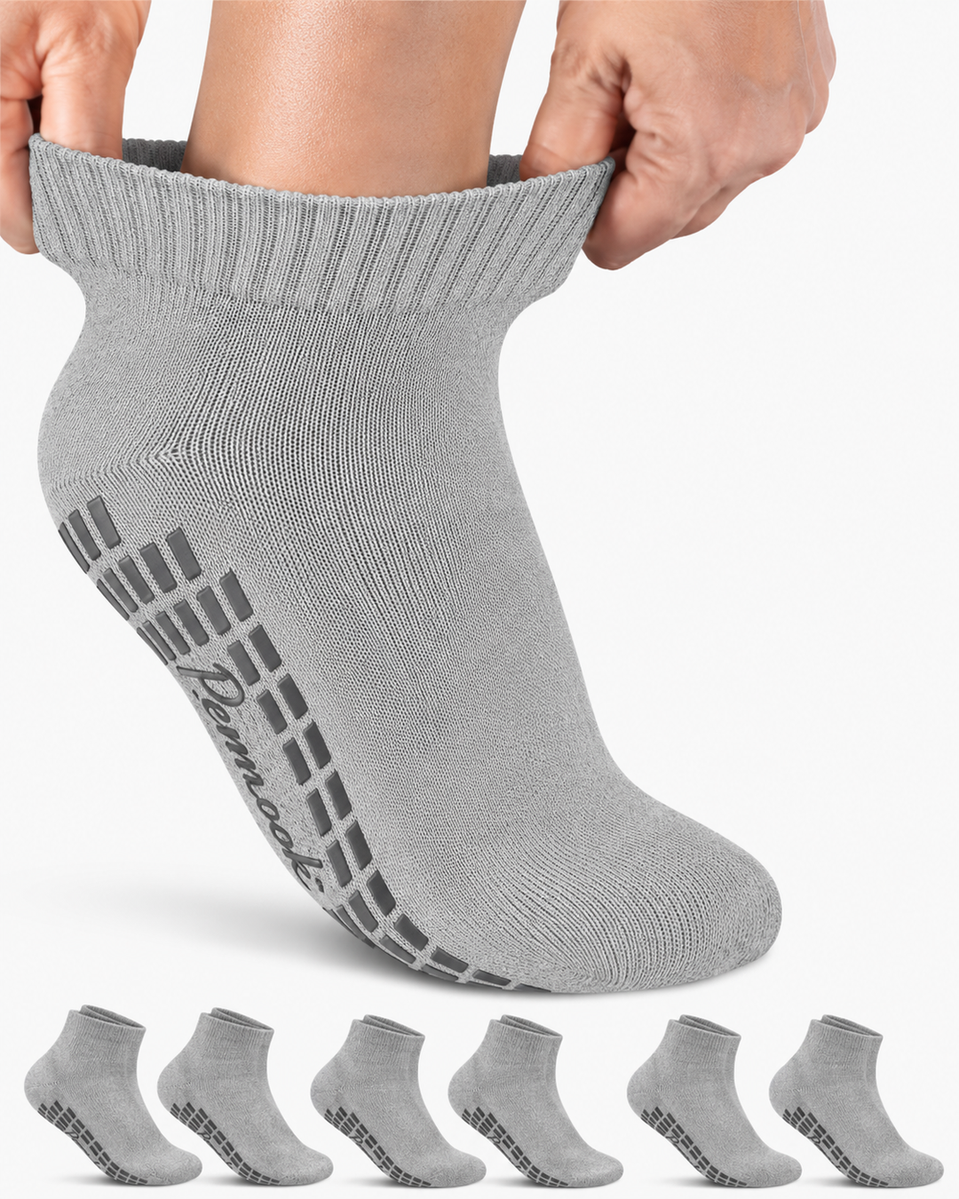 Gray ankle sock with textured sole held up, with six additional socks displayed below on a white background.