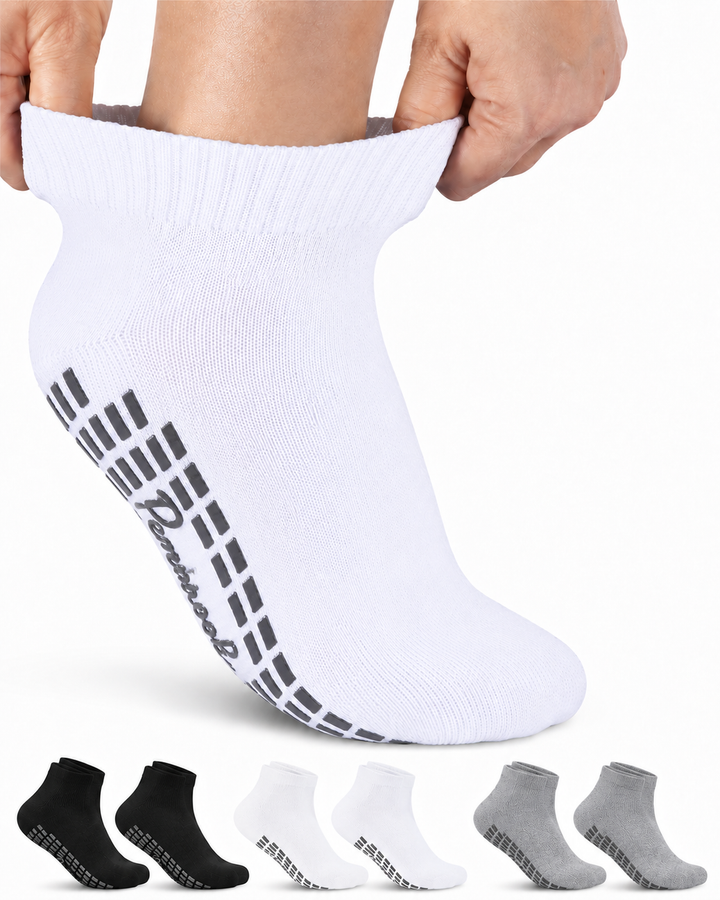 White ankle sock with brand logo held by a person, with additional socks displayed below on a white background.