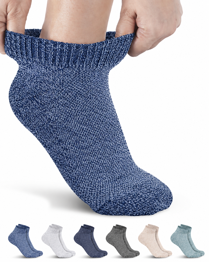 Blue textured sock being worn with a display of other colored socks below on a white background