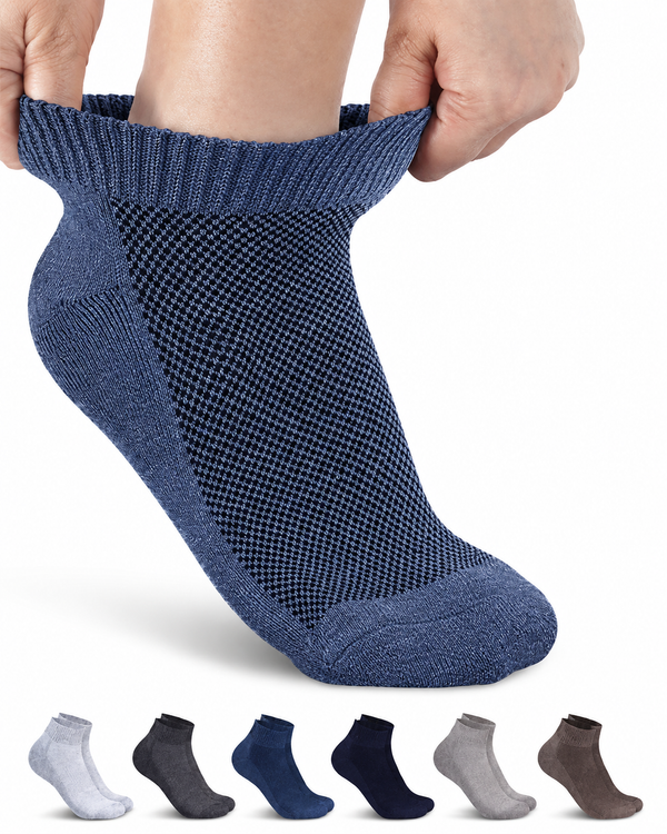 Person wearing a blue ankle sock with a grid pattern, shown on a white background.