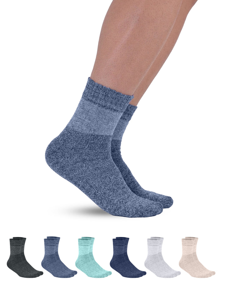 Blue socks being worn with a display of various blue sock colors below on a white background