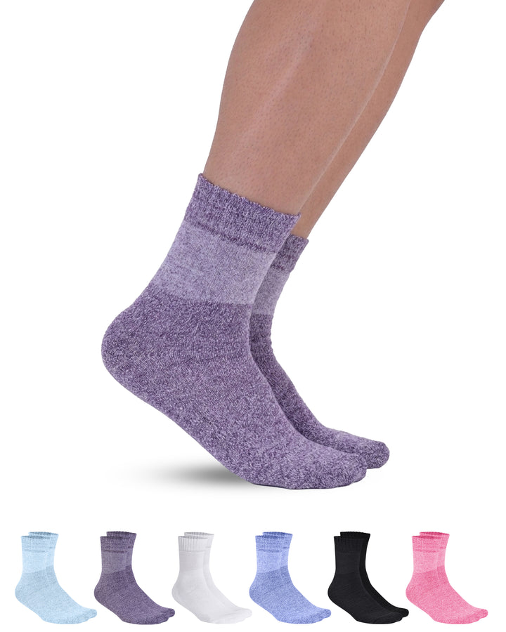 Purple socks worn by a person on a white background with additional socks displayed below.