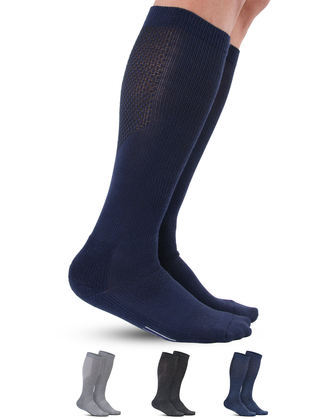 Navy knee-high socks with a patterned top worn by a person on a white background.