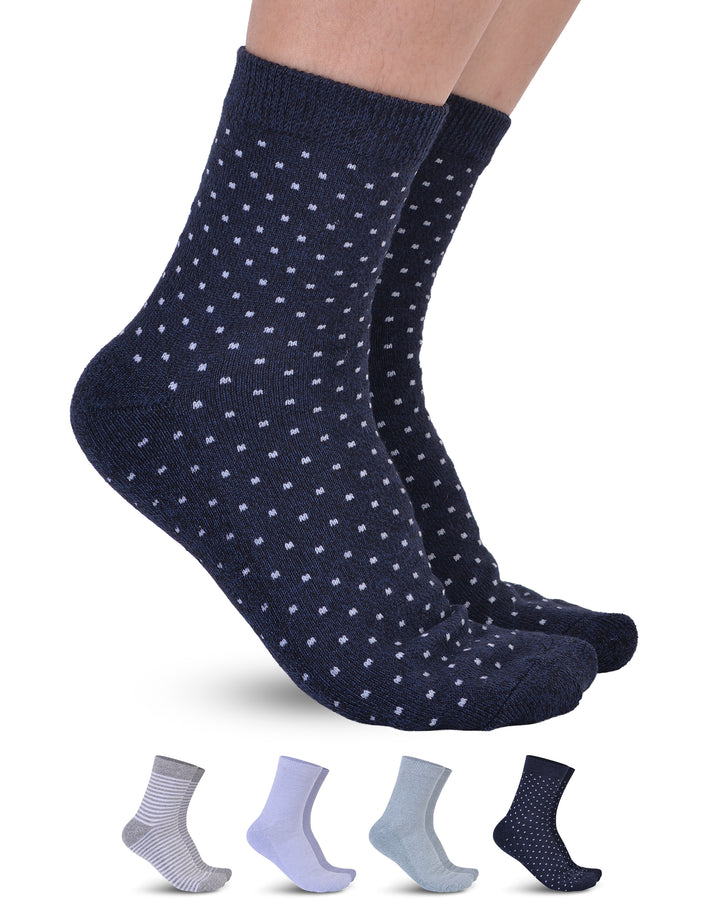 Navy blue socks with white polka dots on a white background