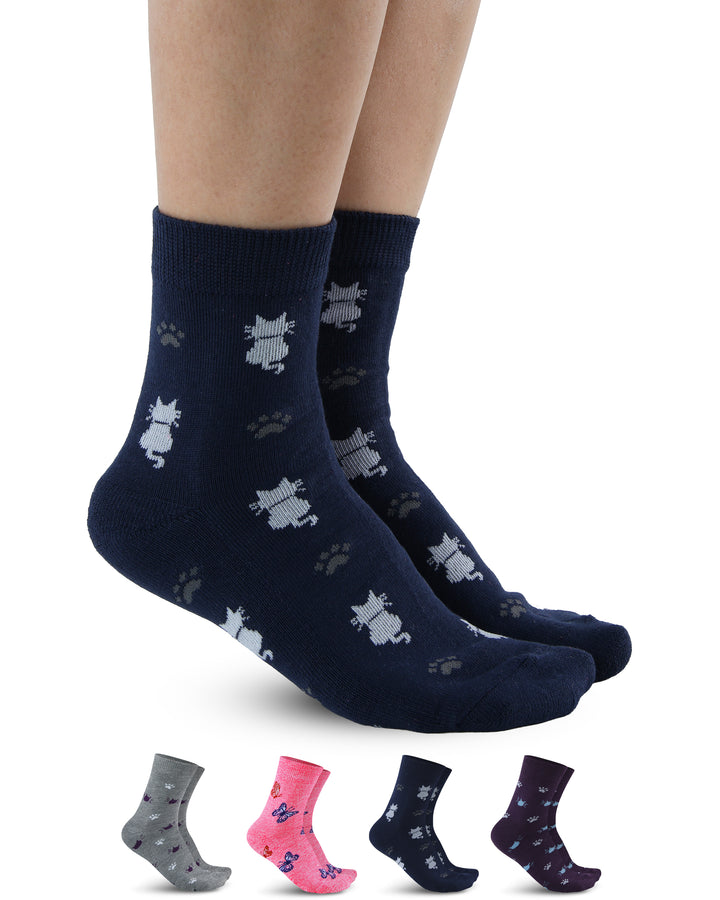 Navy blue socks with cat pattern worn by a person, with additional pairs displayed below on a white background.