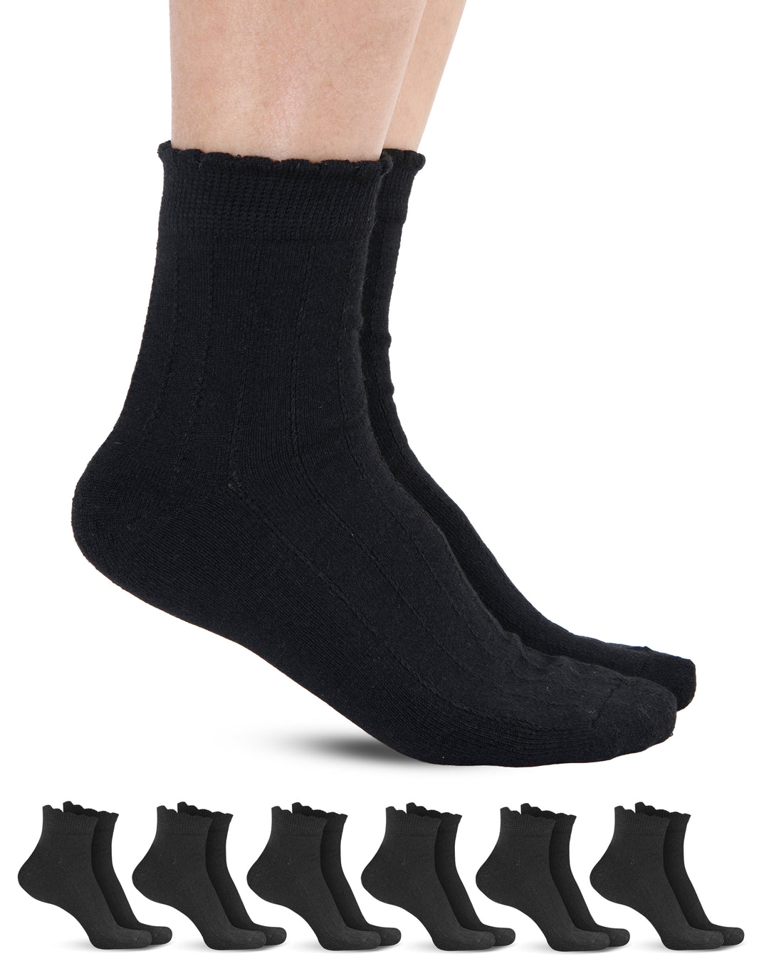 Black socks being worn with a set of black socks displayed below on a white background