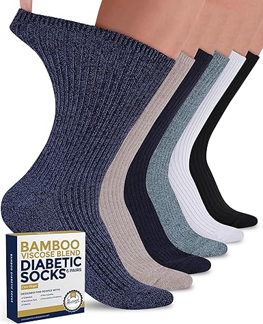 Set of six pairs of diabetic socks in various colors with a packaging box on a white background.