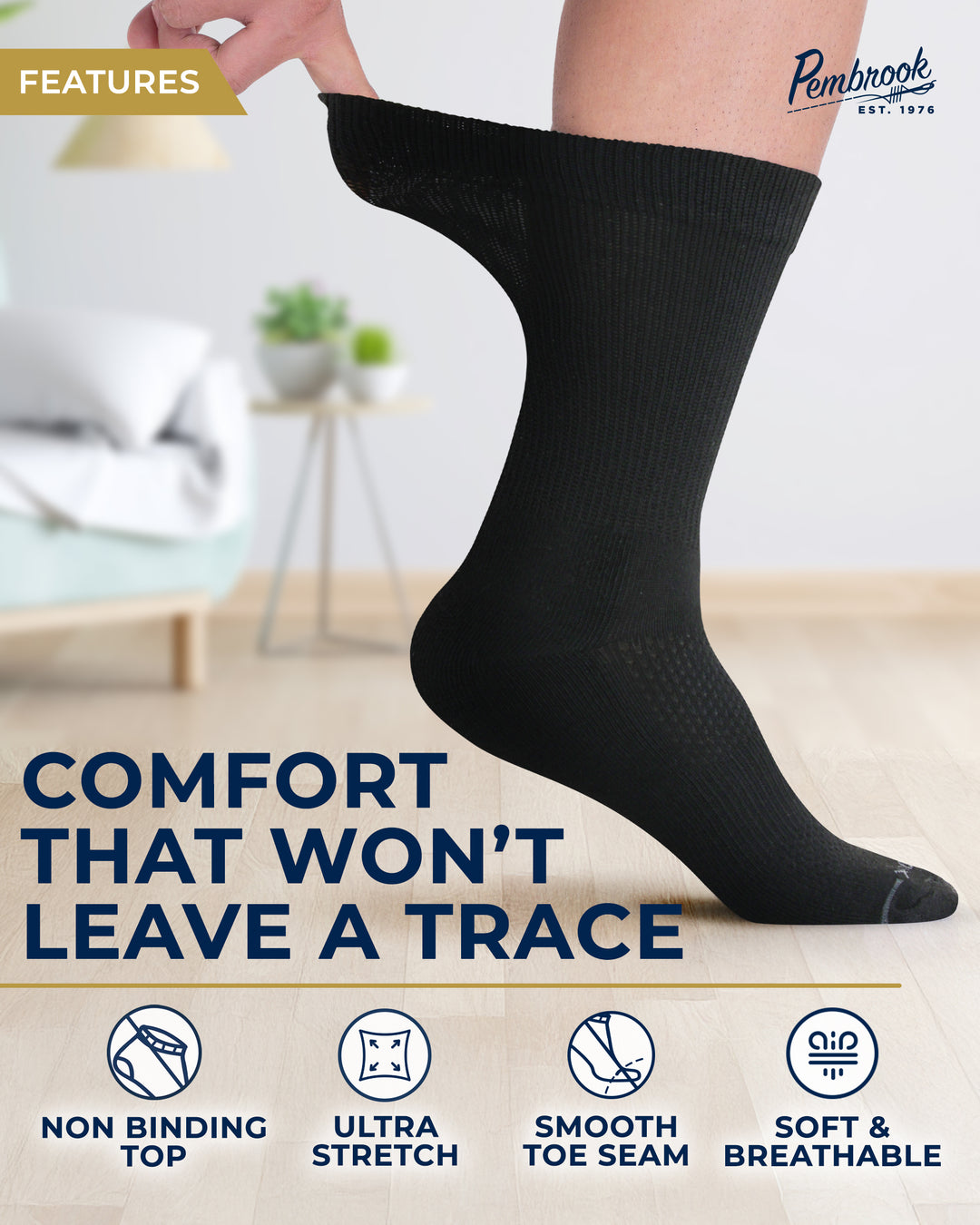 Black socks with text highlighting features on a blurred indoor background