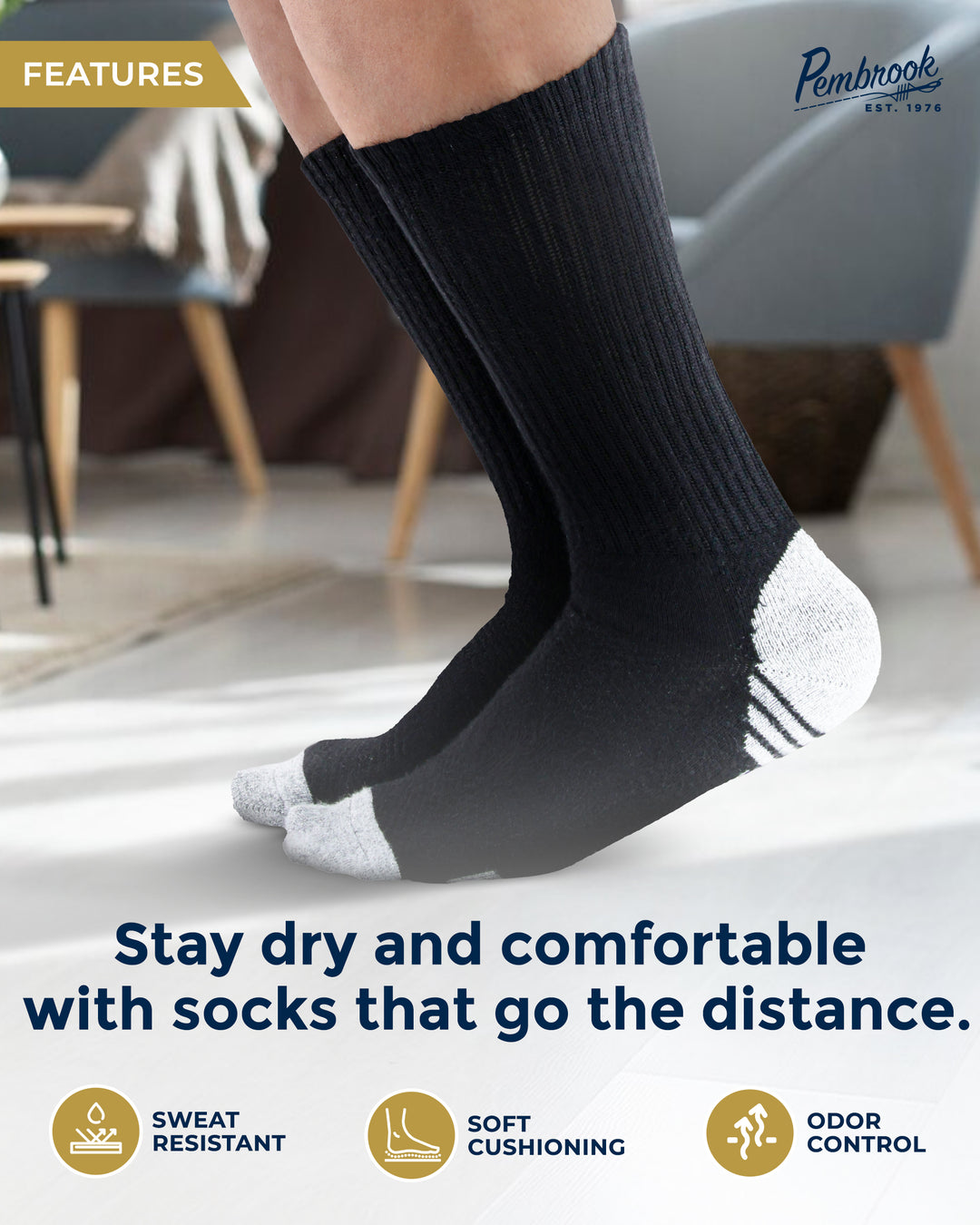Person wearing black socks with white toes and heels indoors, featuring text and logos about sock features.