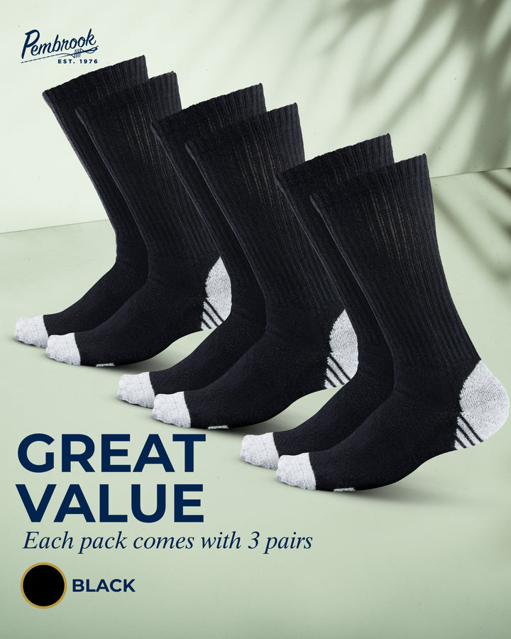 Set of black socks with white toes and cuffs on a light green background, featuring the brand &